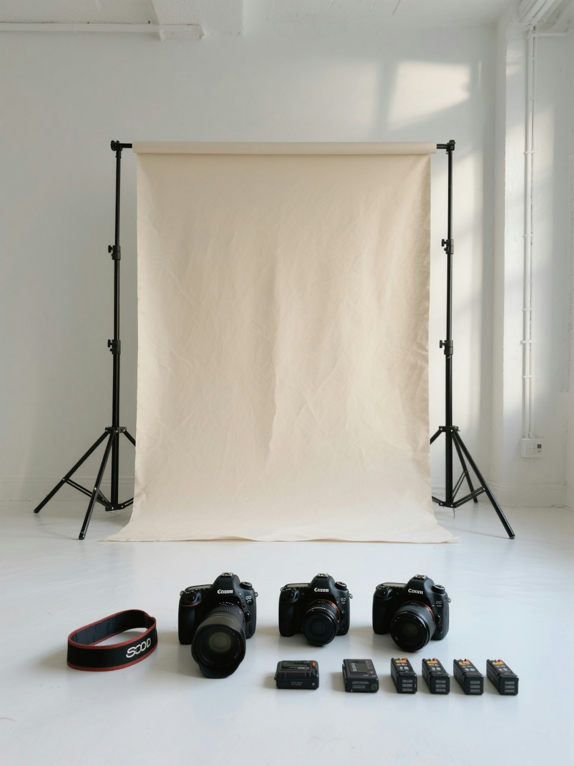 Cameras and lights set up in a photo studio